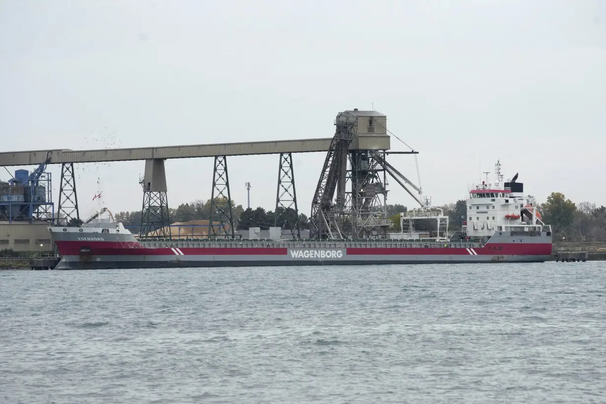 Strikers have shut down a vital Great Lakes shipping artery for days, and negotiations are looming