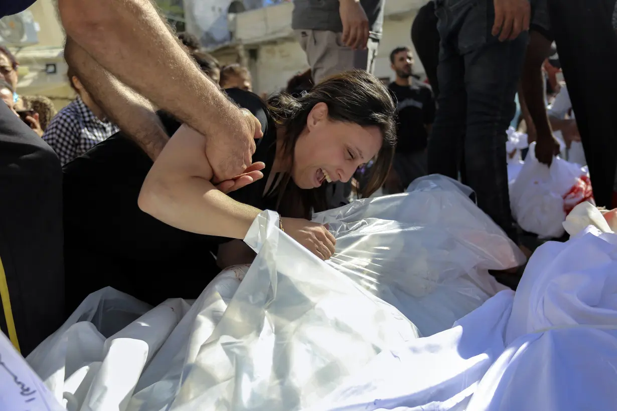 Israel Palestinians Gaza Burying the Dead