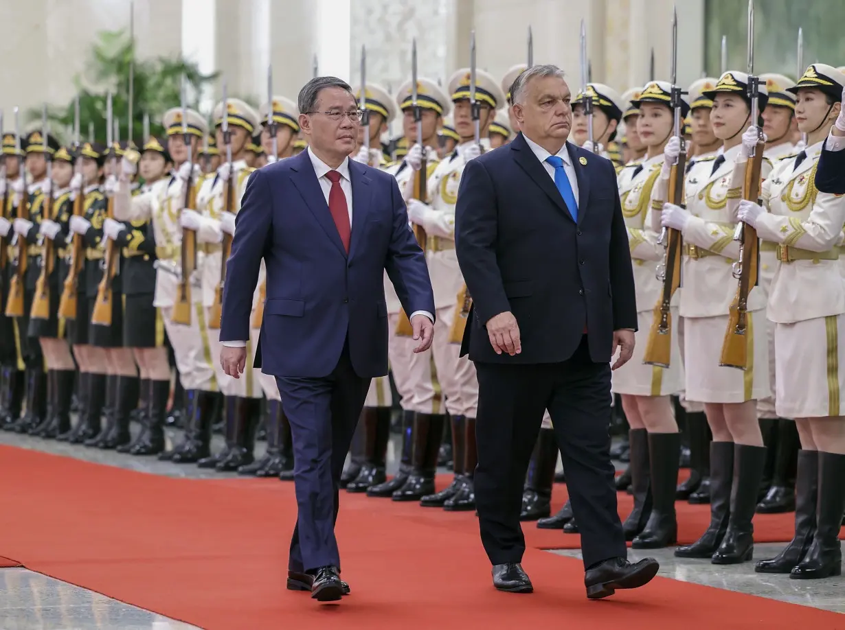 Putin meets with Hungary's prime minister in rare in-person talks with an EU leader