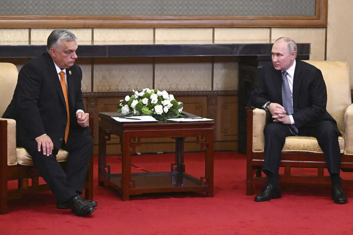 Putin meets with Hungary's prime minister in rare in-person talks with an EU leader