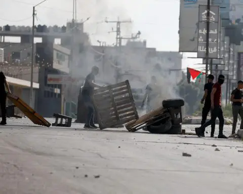 Palestinians flee northern Gaza as Israel masses troops for assault