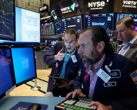 Wall Street ends lower on mixed earnings, robust data