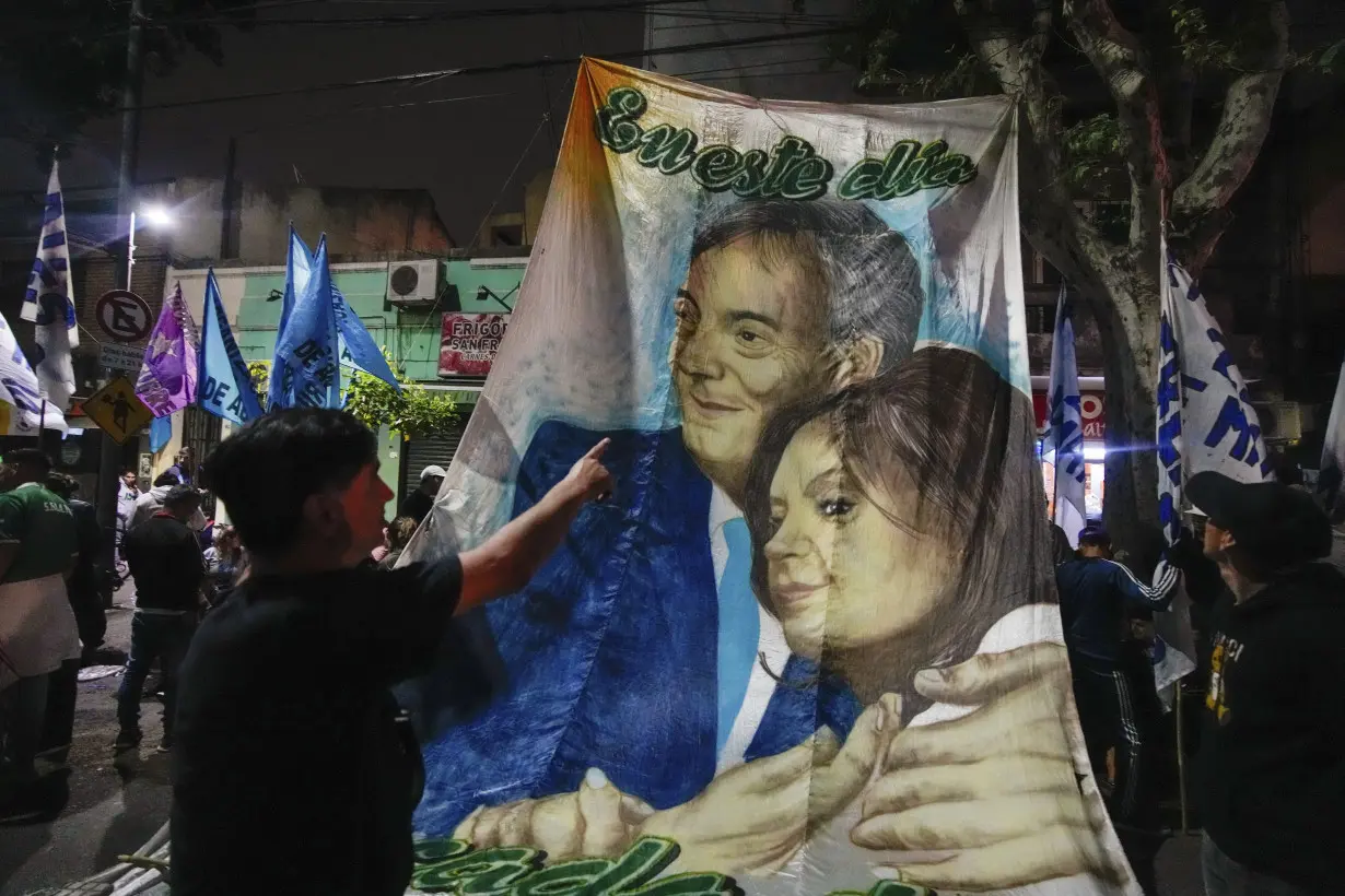 After presidential race surprise, Argentine economy minister and right-wing populist look to runoff