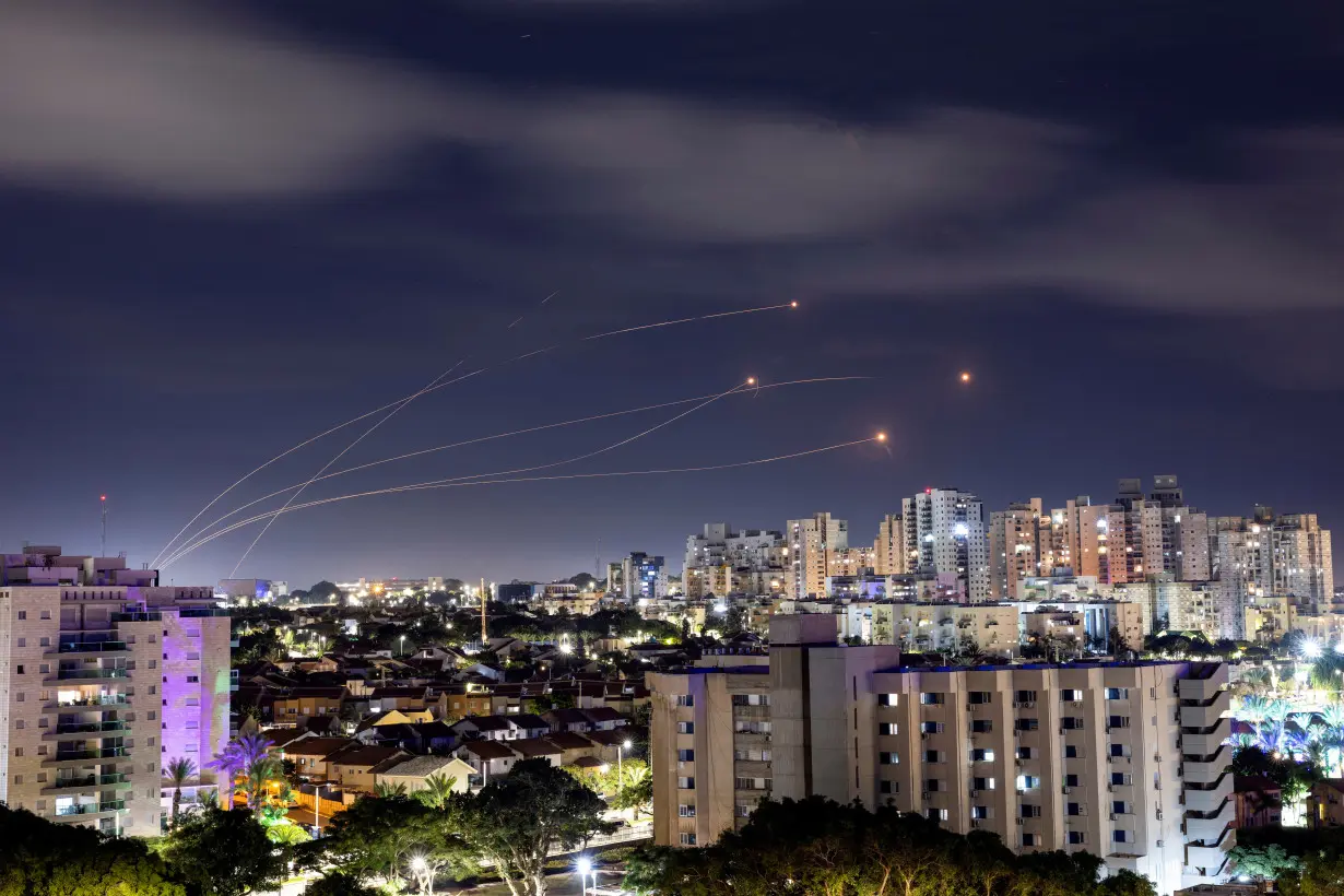 Israel's Iron Dome anti-missile system intercepts rockets launched from the Gaza Strip, as seen from Ashkelon, in southern Israel