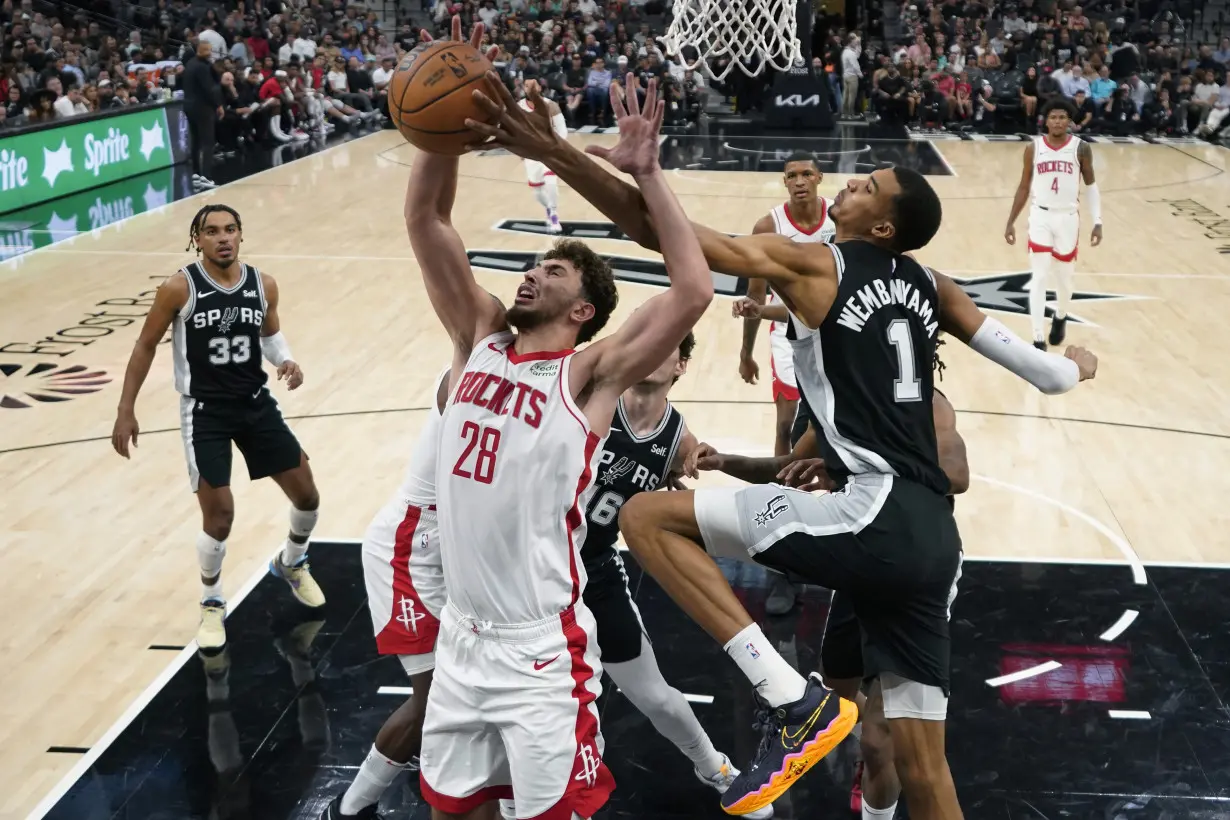 Wembanyama makes tying basket in regulation, then earns his first NBA win as Spurs top Rockets in OT