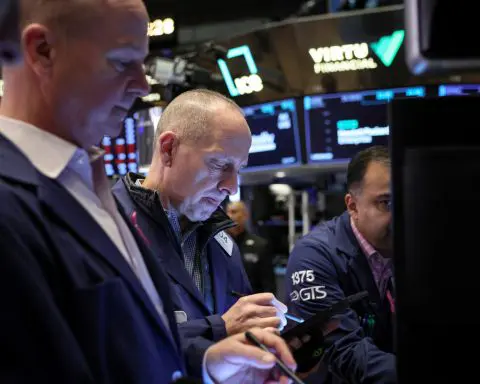 Wall St closes higher on eve of Fed decision; investors assess earnings