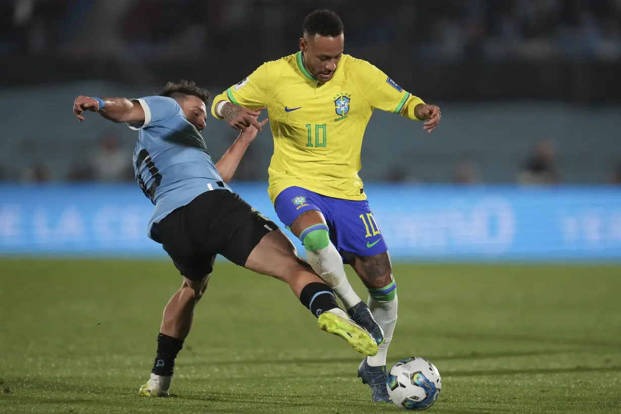 Neymar leaves Brazil match in tears with left knee injury; team doctor says severity unknown