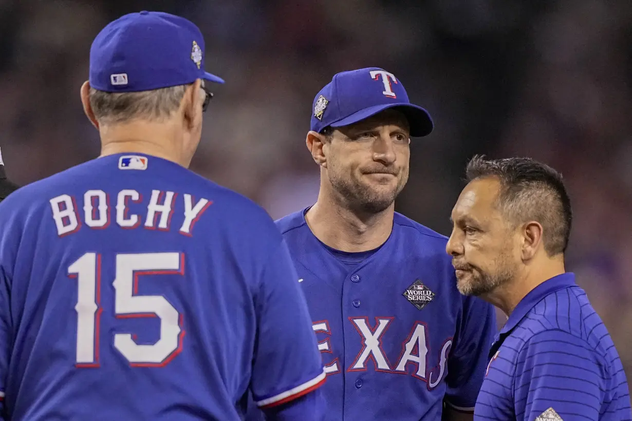 Rangers slugger Adolis García and pitcher Max Scherzer to miss the rest of the World Series