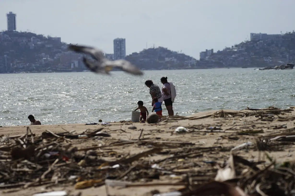 Survivors of deadly Hurricane Otis grow desperate for food and aid amid slow government response