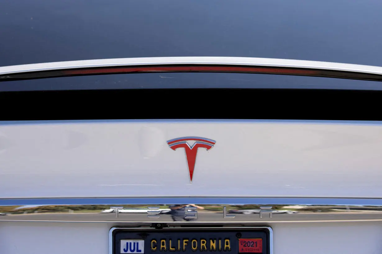 FILE PHOTO: A Tesla Model X is shown at a Tesla service center in Costa Mesa, California