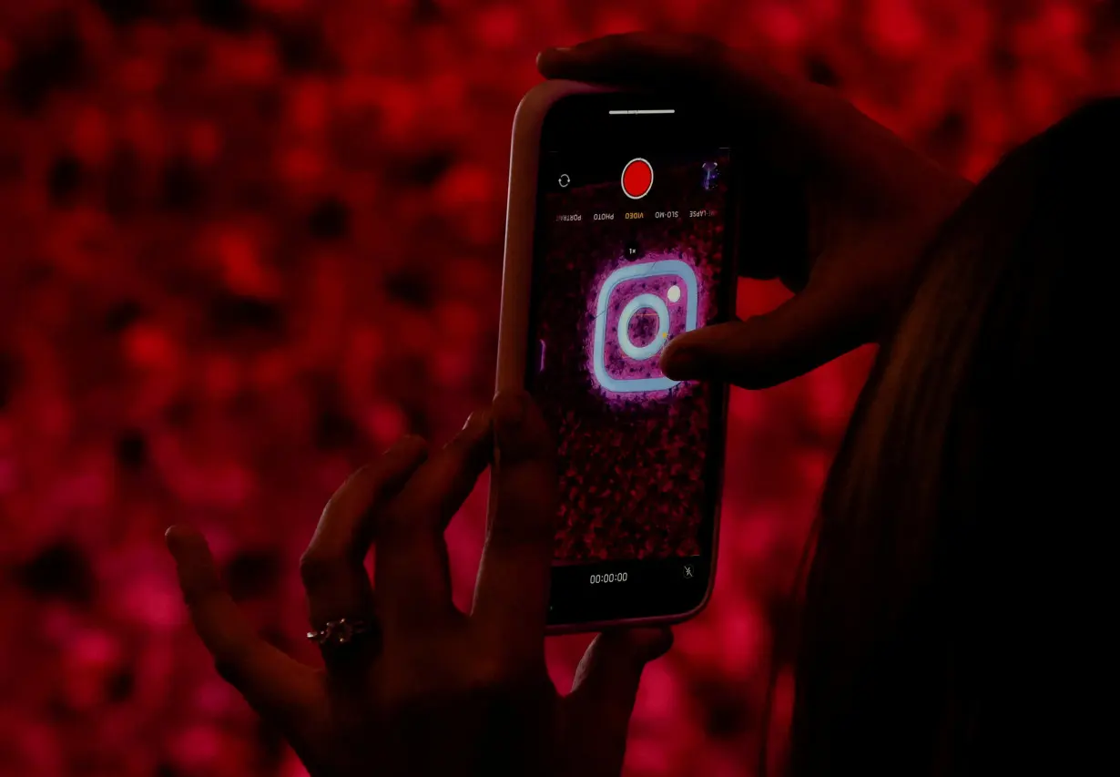 FILE PHOTO: A logo of mobile application Instagram is seen on a mobile phone, during a conference in Mumbai