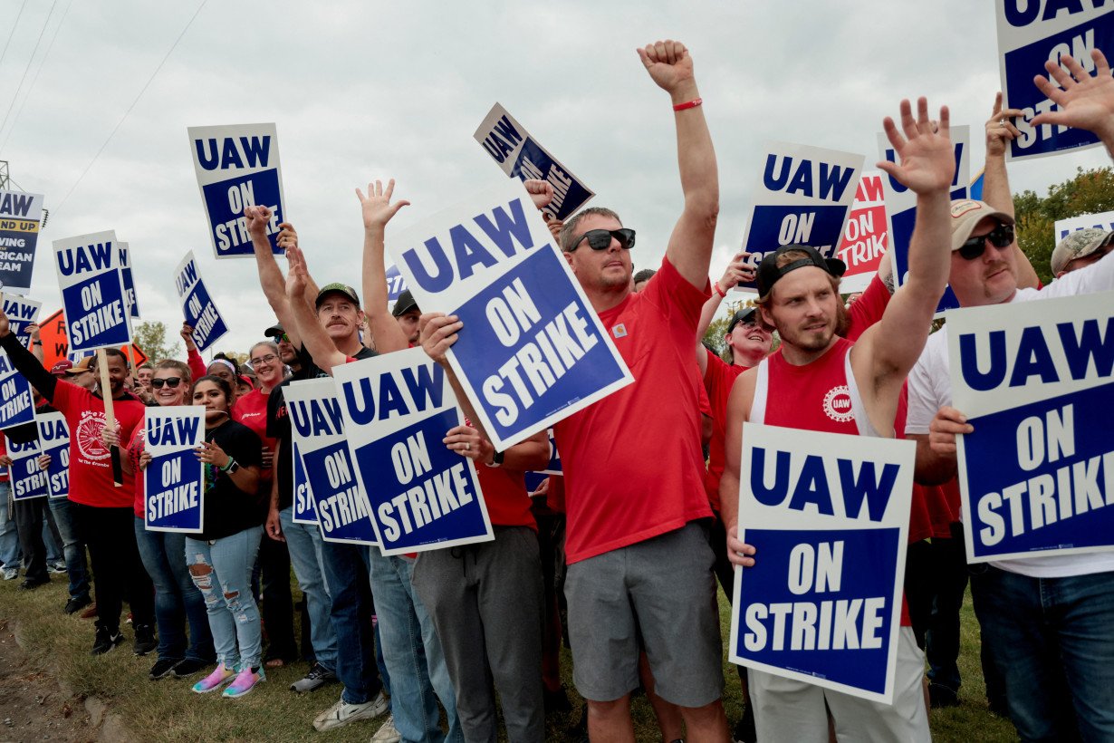 Striking UAW members from the General Motors Lansing Delta Plant picket in Delta Township