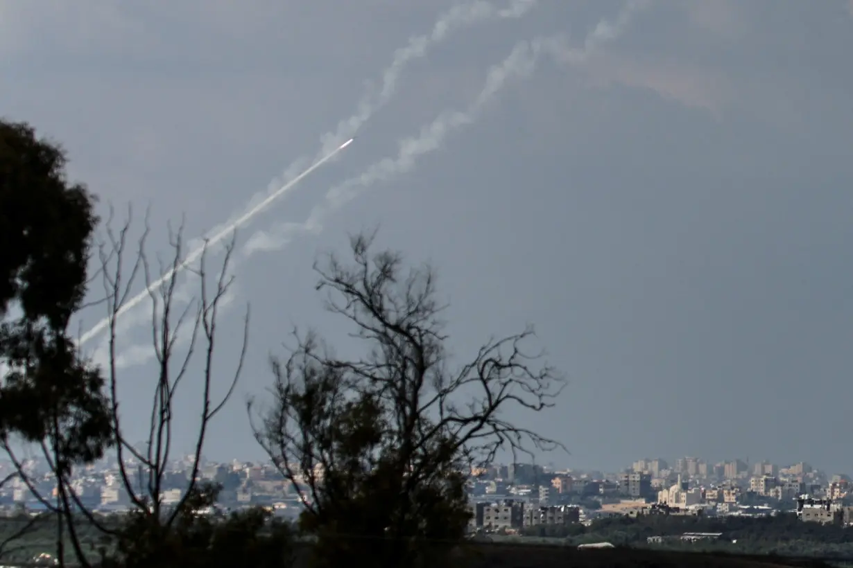 Rockets are launched from the Gaza Strip into Israel, as seen from Israel's border, in southern Israel