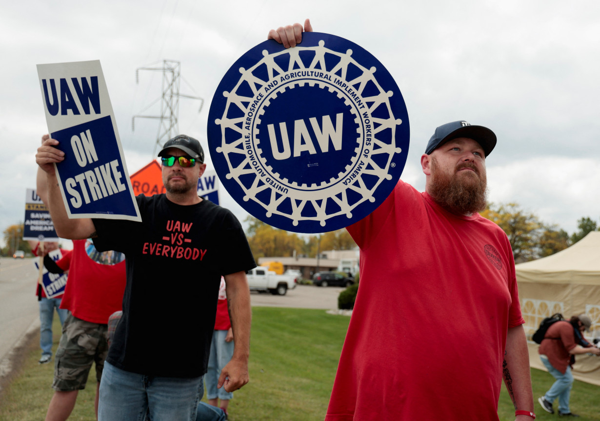 Striking UAW members from the General Motors Lansing Delta Plant picket in Delta Township