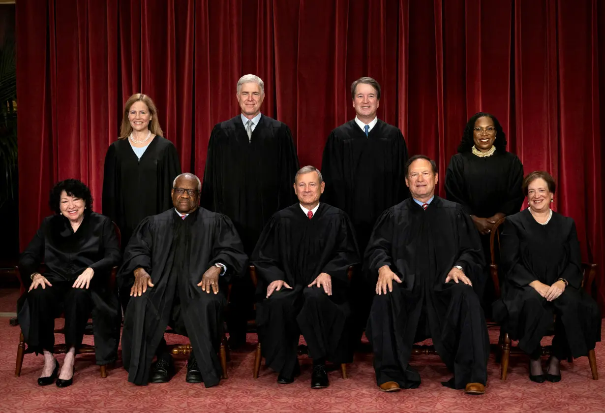 FILE PHOTO: U.S. Supreme Court justices pose for their group portrait at the Supreme Court in Washington