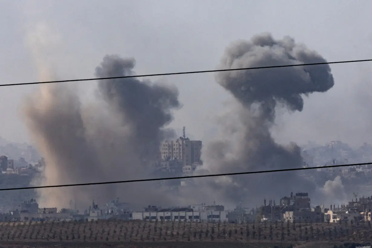 Smoke rises inside the Gaza Strip as seen from Israel