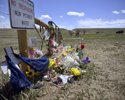 Colorado men accused of taking photo after rock-throwing death will stand trial for murder