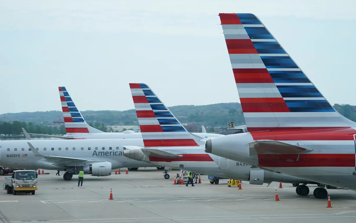 American Airlines jets sit at gates at Washington's Reagan National airport in Washington