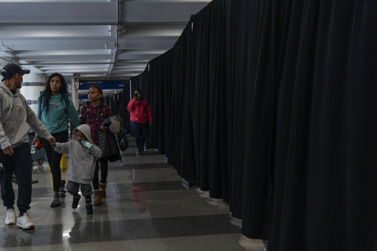 Chicago is keeping hundreds of migrants at airports while waiting on shelters and tents