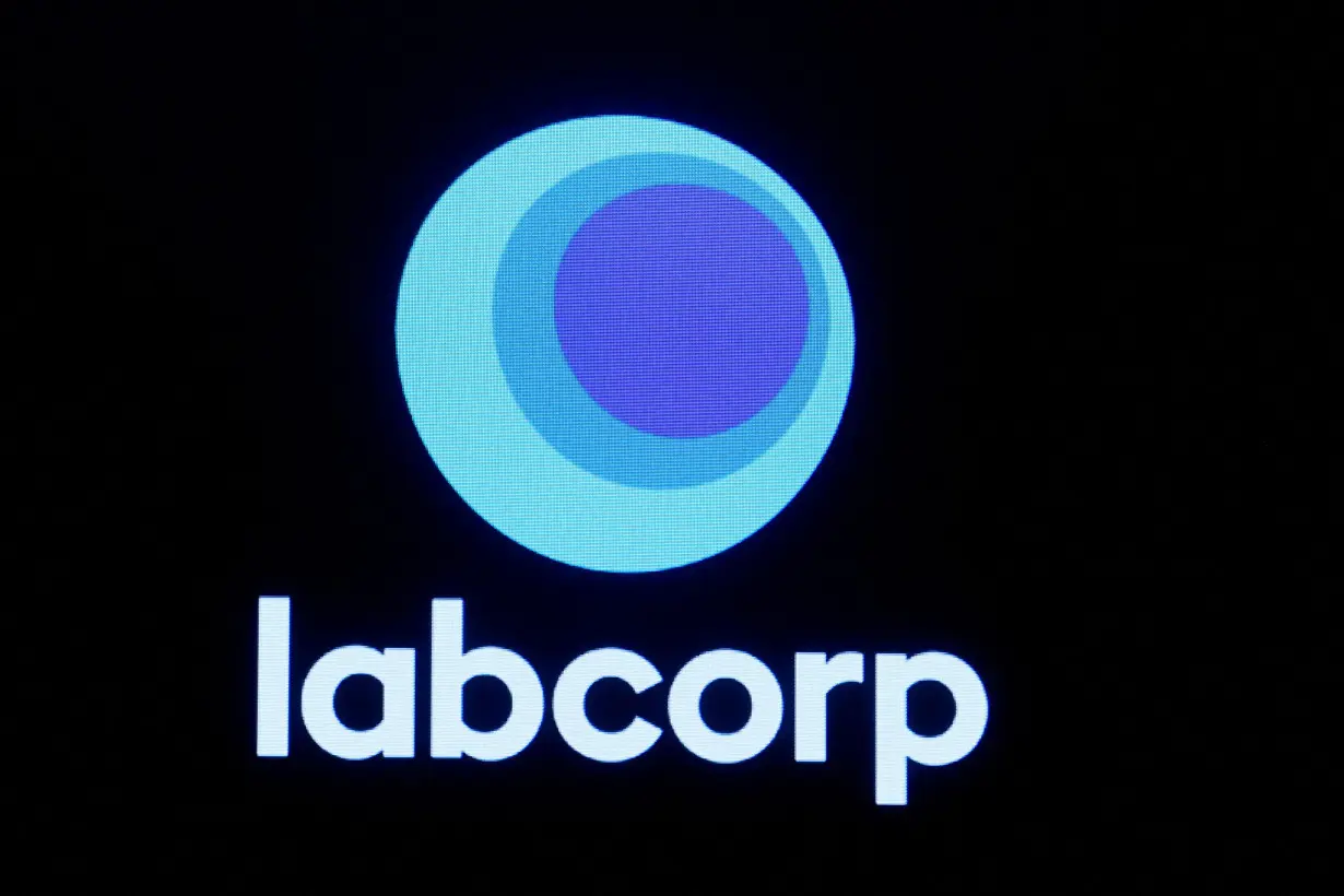 FILE PHOTO: FILE PHOTO: The logo for Labcorp is displayed on a screen on the floor of the NYSE in New York