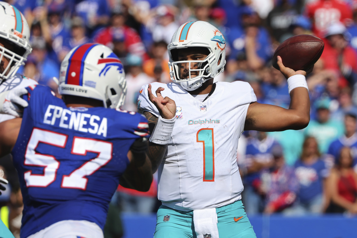 Josh Allen throws 4 TD passes, runs for score, Bills rout division rival Dolphins 48-20