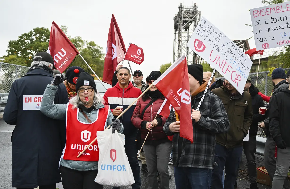 Strikers have shut down a vital Great Lakes shipping artery for days, and negotiations are looming