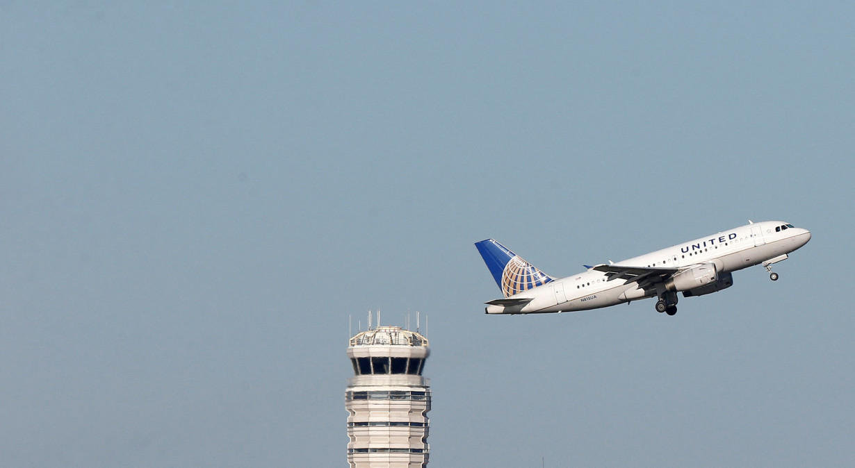 FILE PHOTO: A United Airlines Airbus A319 jet takes off from Washington National Airport in Washington