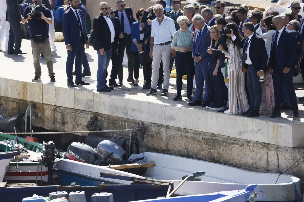 EU pledges crackdown on 'brutal' migrant smuggling during visit to overwhelmed Italian island