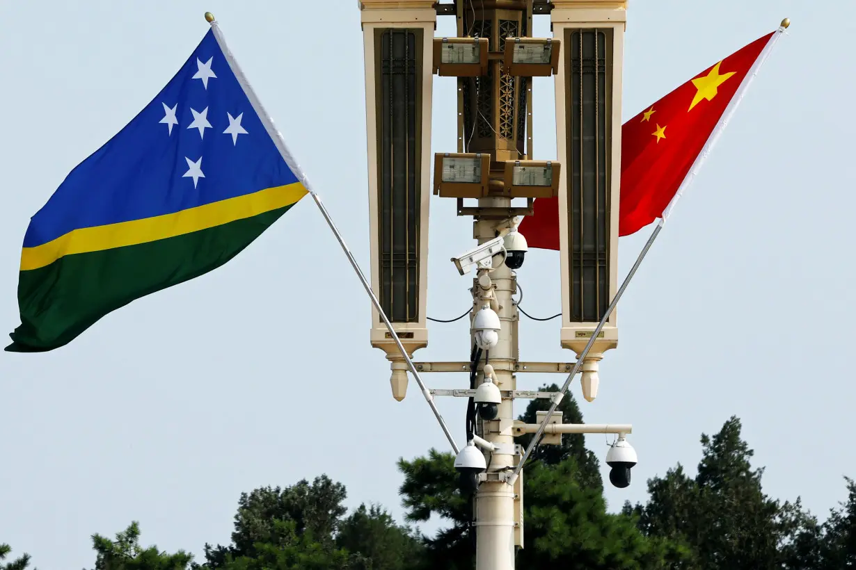 Flags of Solomon Islands and China in Beijing