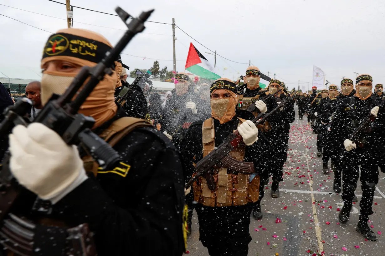 FILE PHOTO: Palestinian Islamic Jihad militants participate in an anti-Israel military parade marking the 36th anniversary of the movement's foundation in Gaza City