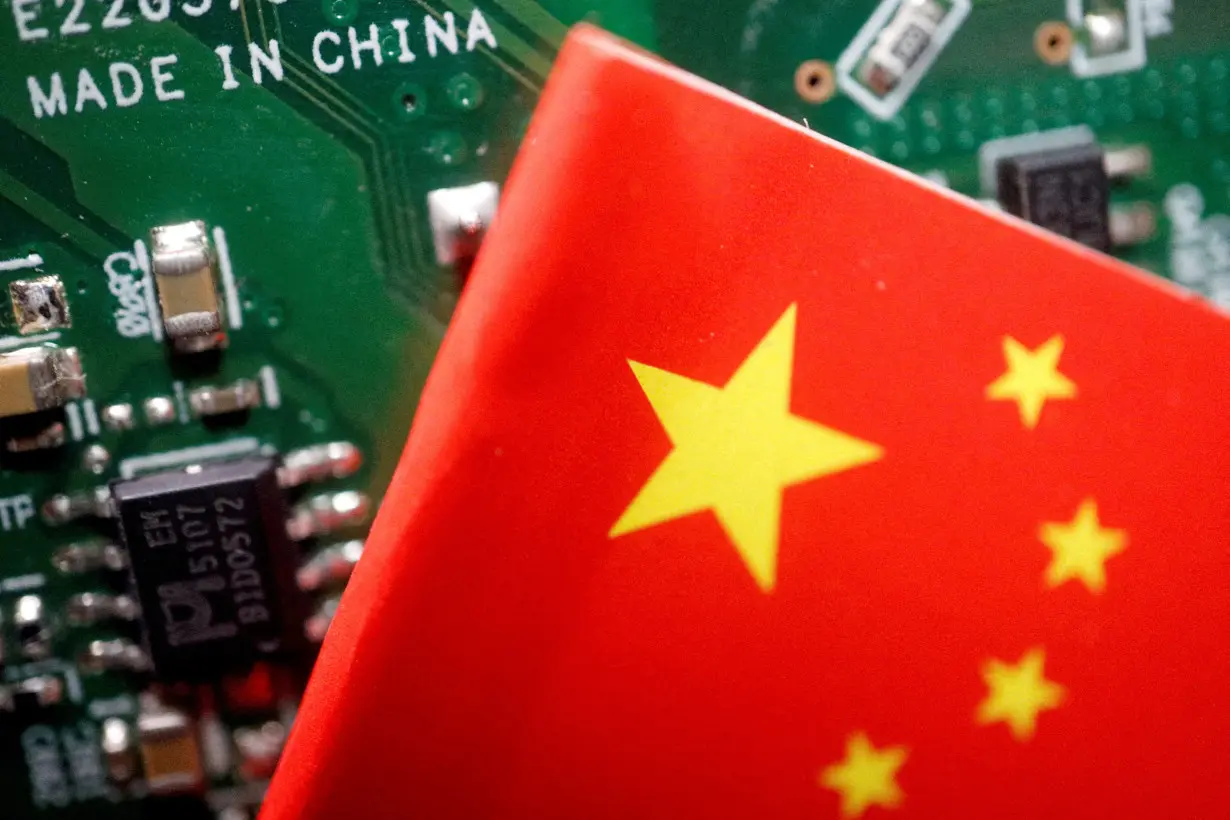 FILE PHOTO: Illustration picture of Chinese flag with semiconductor chips