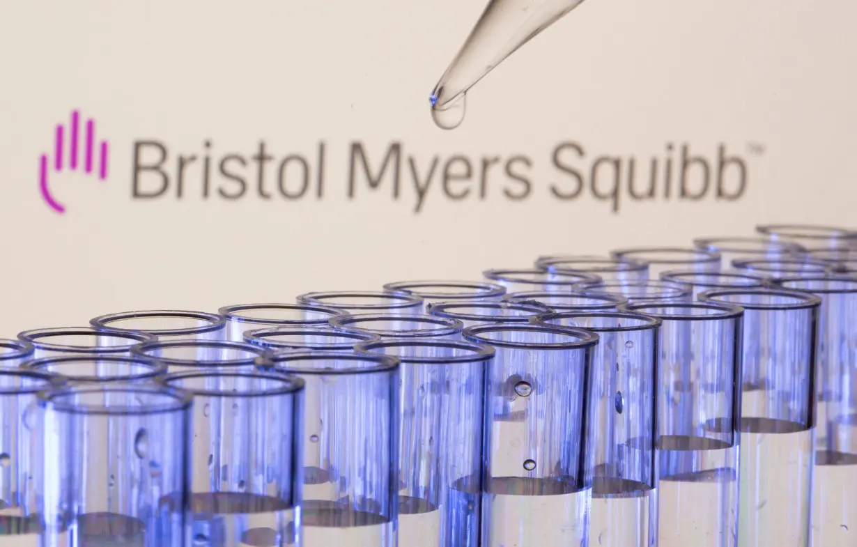 FILE PHOTO: Test tubes are seen in front of a displayed Bristol Myers Squibb logo in this illustration