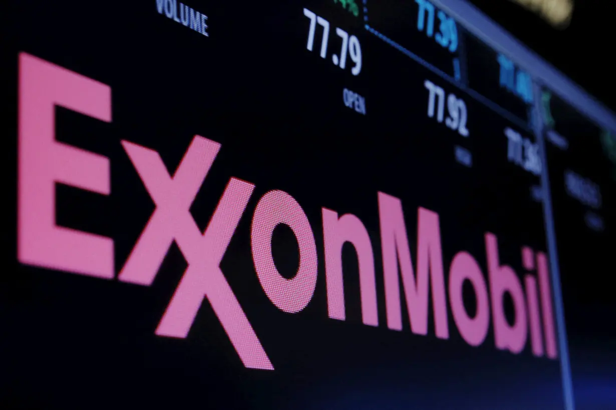 FILE PHOTO: The Exxon logo is displayed agove the floor of the New York Stock Exchange (NYSE) shortly after the opening bell in New York