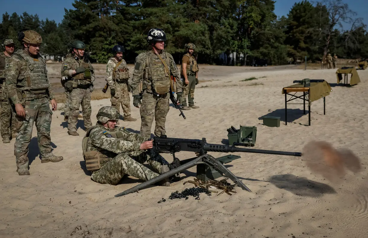 FILE PHOTO: Ukrainian servicemen attend a military exercise in Kyiv region