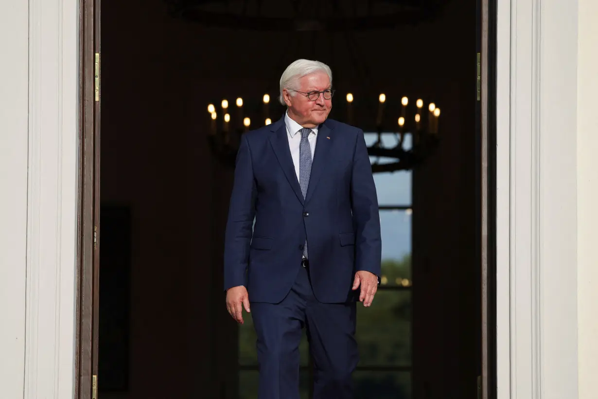 German President Steinmeier walks to receive on the day he meets the Presidents of Kazakhstan, Kyrgyzstan, Tajikistan, Uzbekistan and Turkmenistan's former President at Bellevue Palace in Berlin