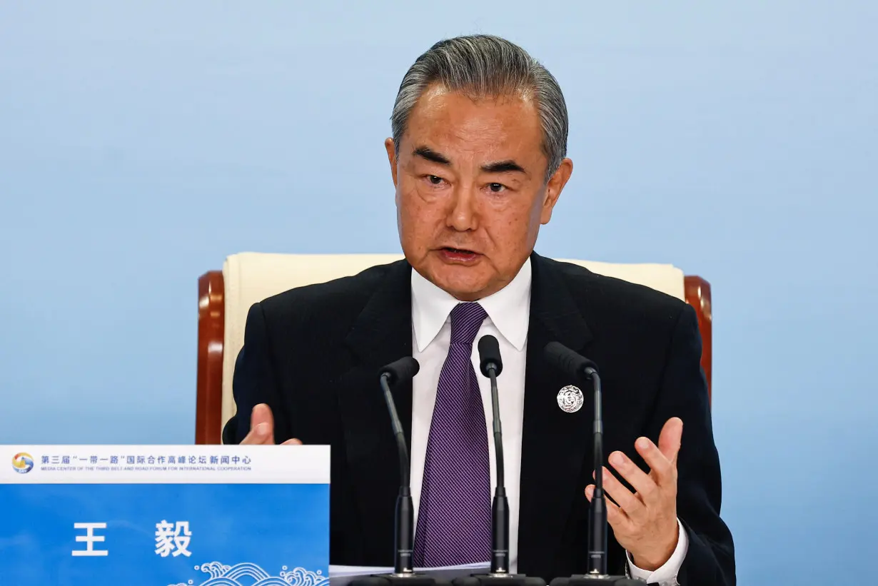 Chinese Foreign Minister Wang Yi speaks at a press conference of the Third Belt and Road Forum (BRF), at the media centre in Beijing