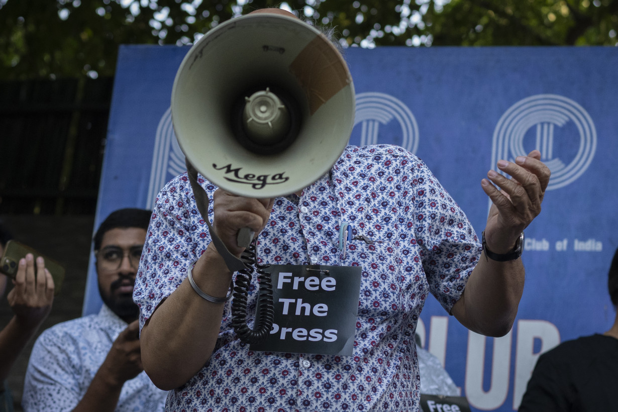 Indian police arrest a news site's editor and administrator after raiding homes of journalists