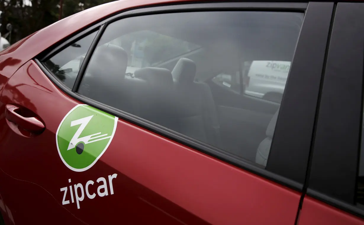 A logo is seen on a Zipcar in San Francisco