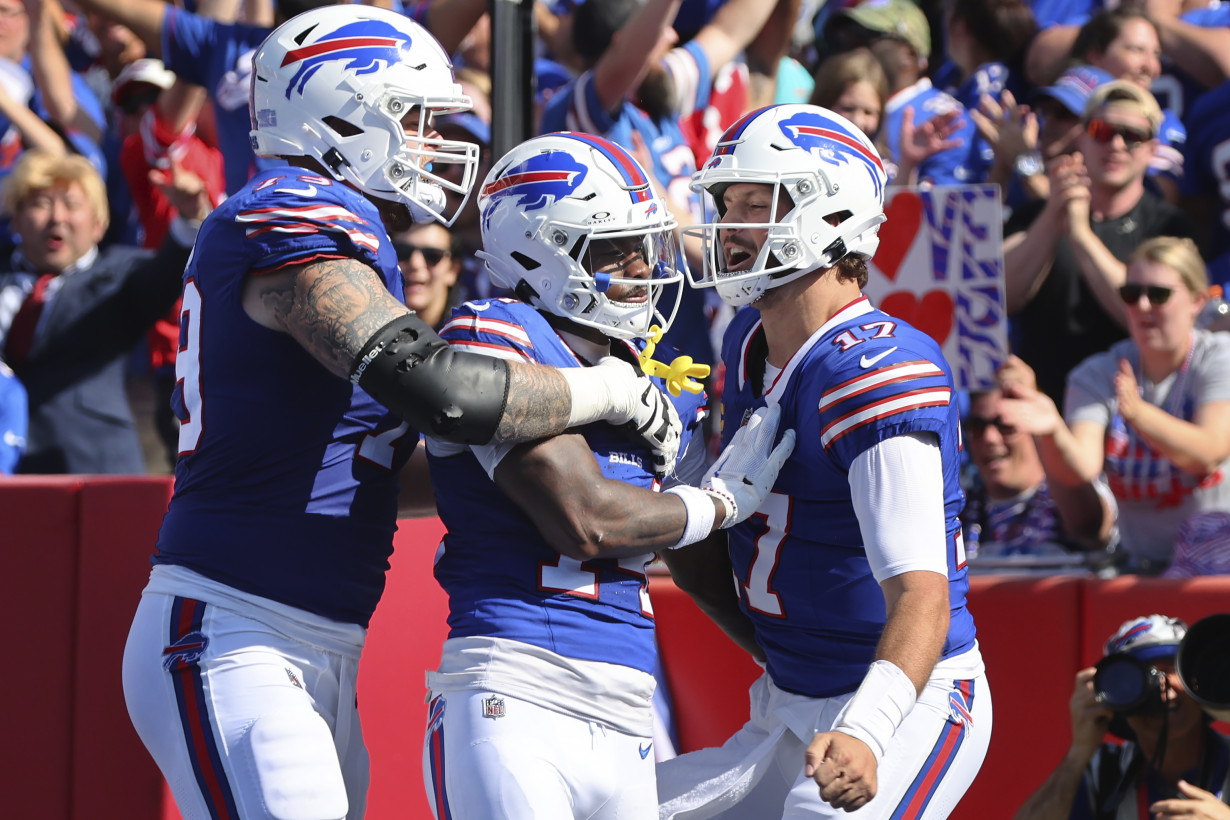 Josh Allen throws 4 TD passes, runs for score, Bills rout division rival Dolphins 48-20