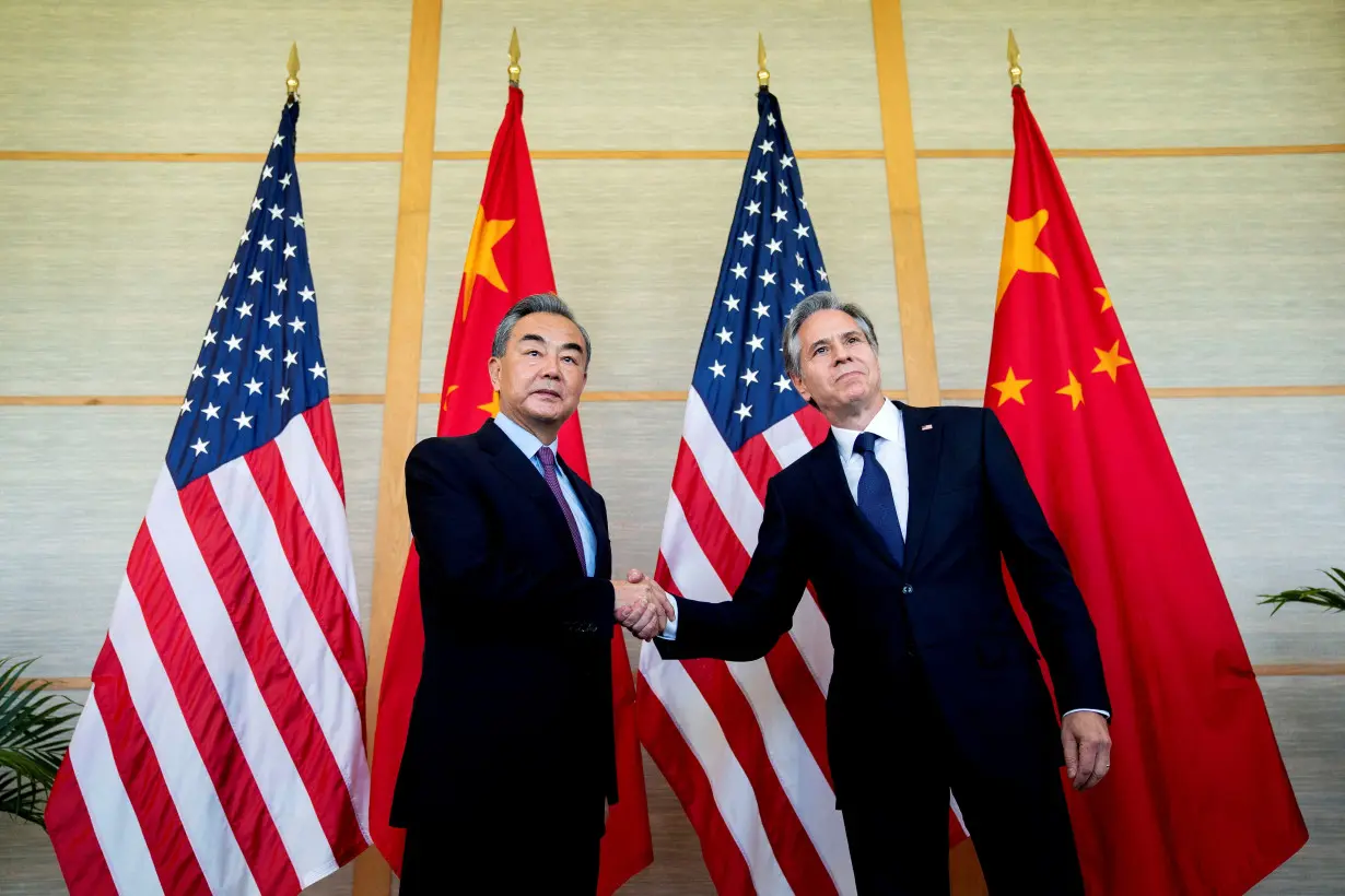 FILE PHOTO: US Secretary of State Antony Blinken meets Chinese Foreign Minister Wang Yi during a meeting in Nusa Dua, Bali