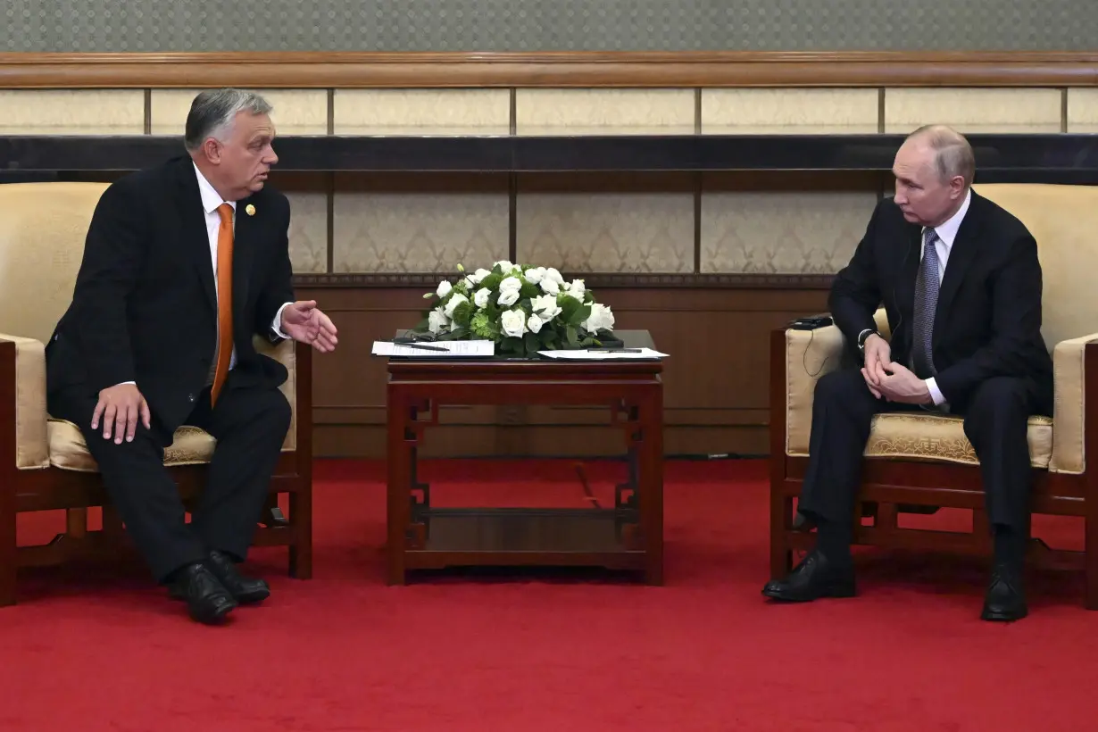 Putin meets with Hungary's prime minister in rare in-person talks with an EU leader