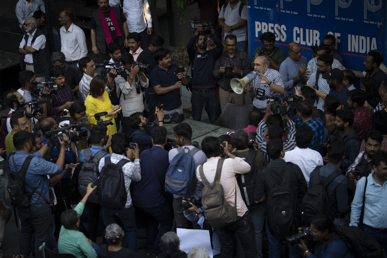 Indian police arrest a news site's editor and administrator after raiding homes of journalists