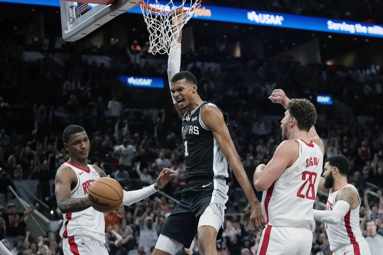 Wembanyama makes tying basket in regulation, then earns his first NBA win as Spurs top Rockets in OT