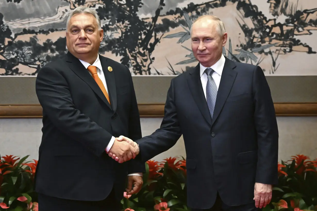 Putin meets with Hungary's prime minister in rare in-person talks with an EU leader