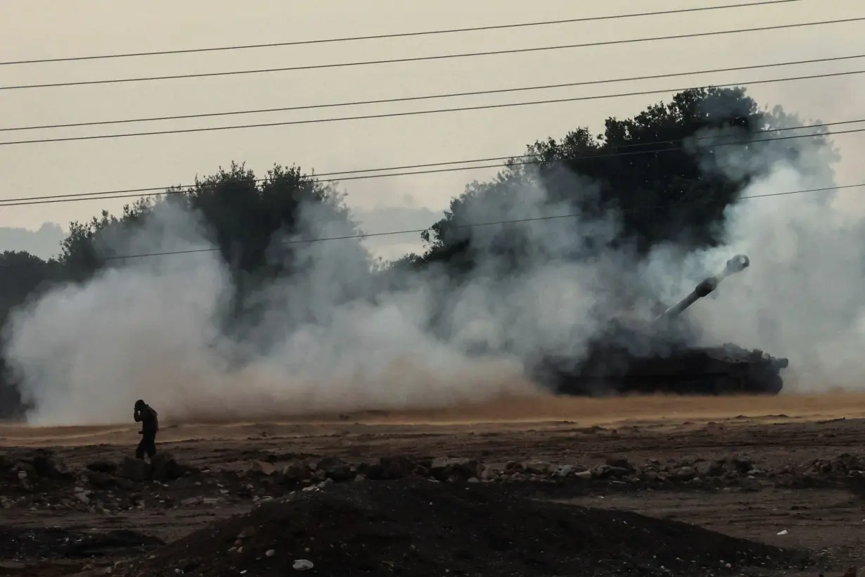 An Israeli tank is positioned near Israel's border with Lebanon