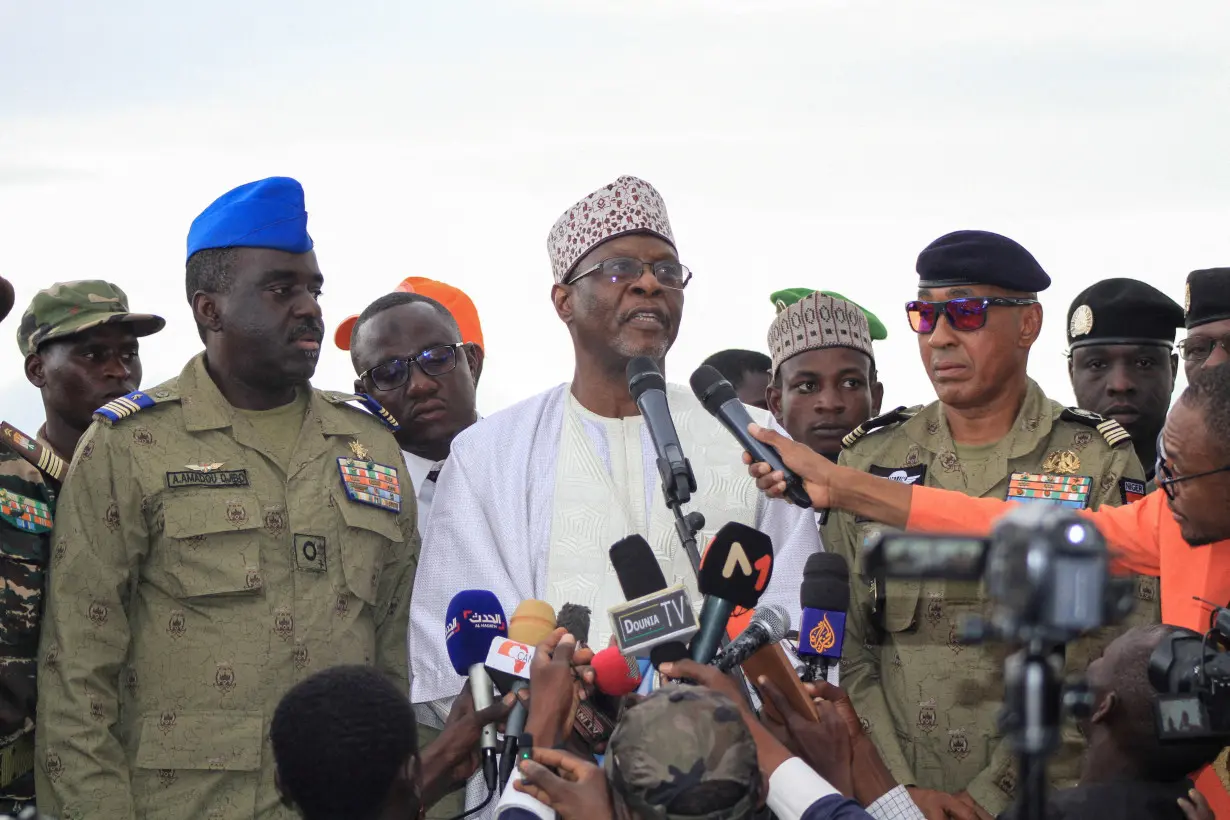 Niger junta's supporters hold rally to demand the French army to leave near French military base in Niamey