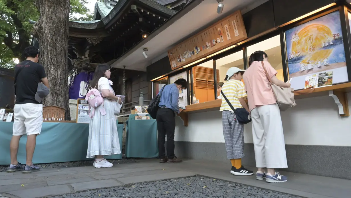 In secular Japan, what draws so many to temples and shrines? Stamp collecting and tradition