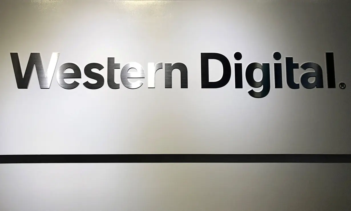 FILE PHOTO: The logo of Western Digital Corporation is displayed at the company's headquarters in Tokyo