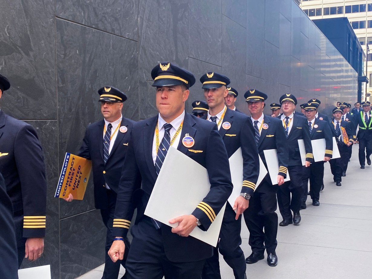 United Airlines pilots protest for a new contract in downtown Chicago