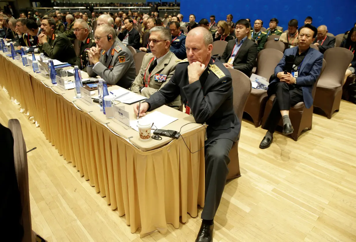 FILE PHOTO: Military delegates attend the Xiangshan Forum in Beijing